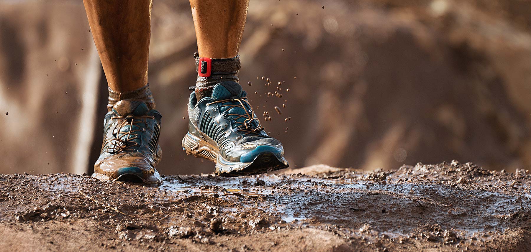 bigstock-Mud-Race-Runners-Detail-Of-The-252246925